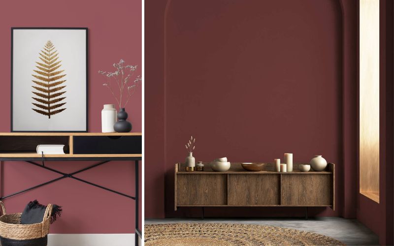 Rote Farbe für Innenwände: links warmes Rot hinter Konsole mit Wandbild und Vasen, rechts tiefrote Wand mit Rundbogen-Nische, Holzsideboard und natürlicher Deko 